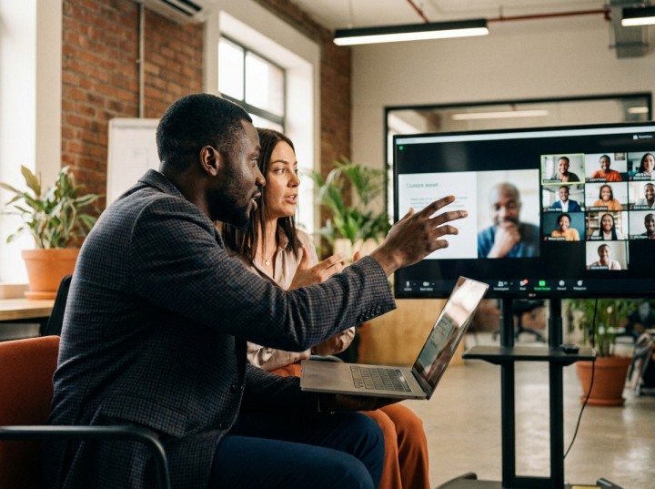 Founders reviewing a pitch during a video call with an investor